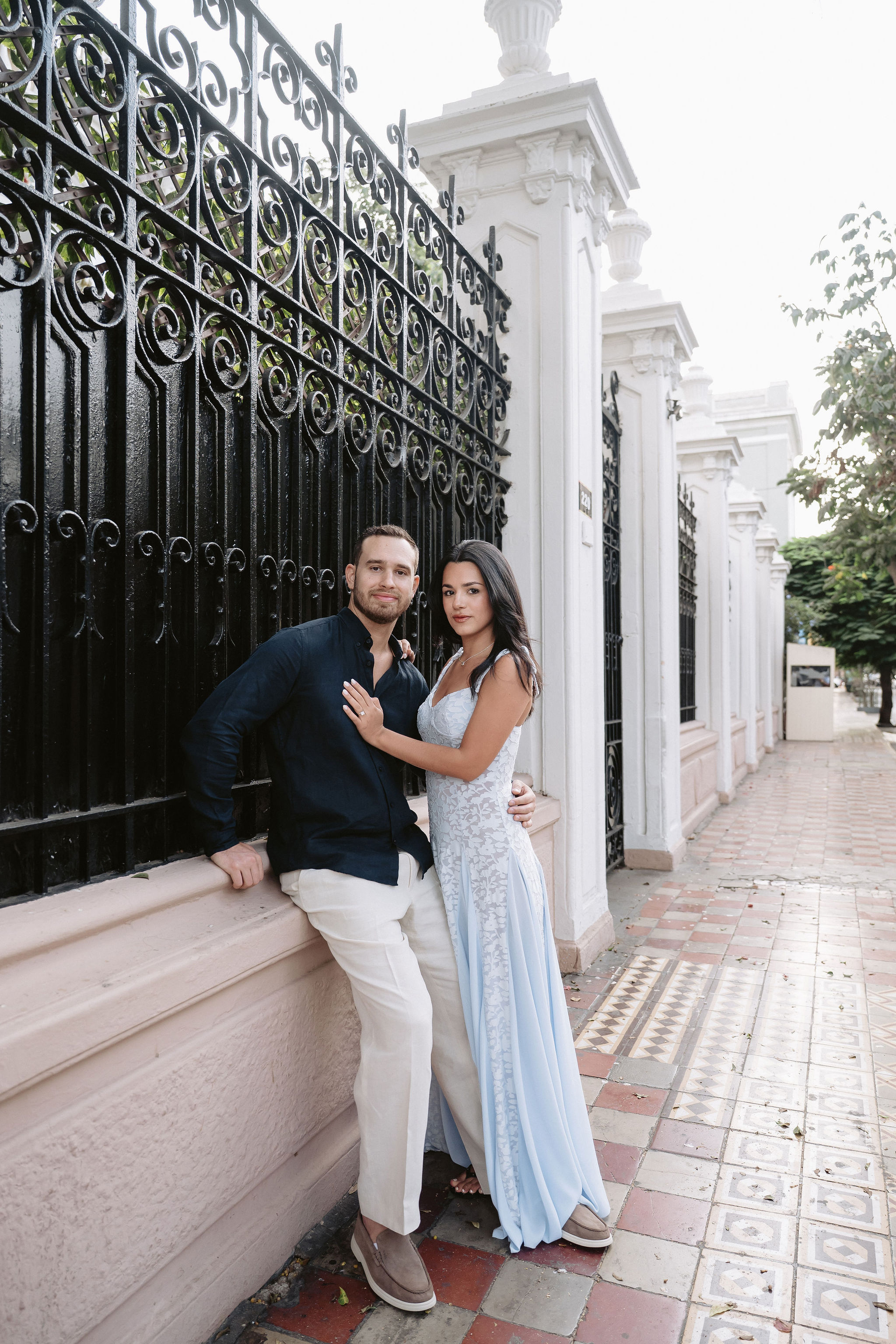 Daniela and Jeremy by the ocean at sunset